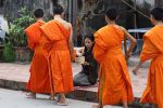 Monks on their morning round for alms. Luang Prabang