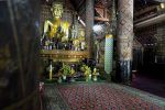 Interior detail showing Buddha in Wat Xiang Thong temple in Luang Prabang