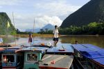 Boatman at the boat-harbour at Muang Ngoi